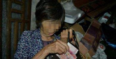 91岁老翁银行取钱 回家途中遭68岁老太抢劫