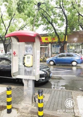 城市公用电话亭：拆撤还是“变身”？
