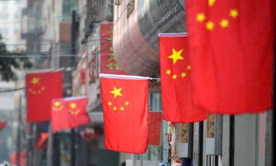 人民日报:中国是全球发展的推动者 不是在搞经济侵略