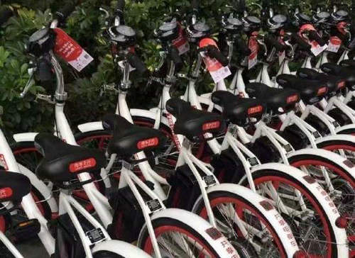 共享电单车赛道再燃战火 能否告别无序竞争？