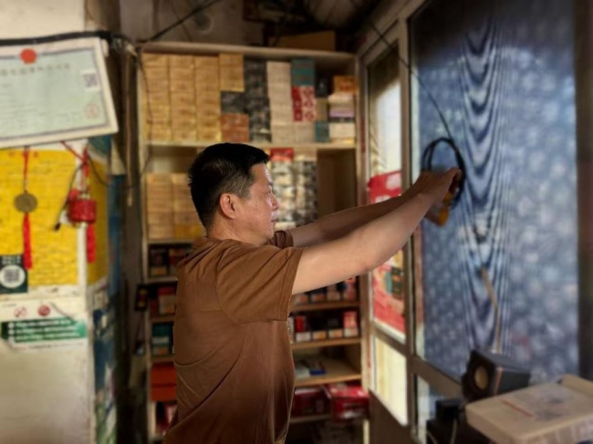 湖北罗田：防汛帮扶进小店 筑牢经营安全网